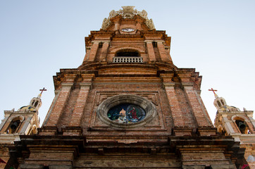 The clock tower of Our Lady of Guadalupe in Puerto Vallarta, Mexico