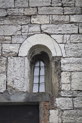 Antique window with iron bars
