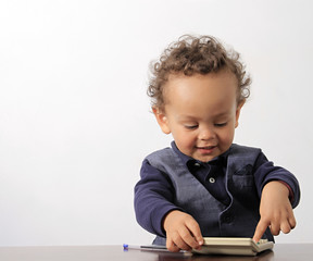 small boy with calculators