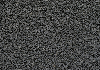 Fototapeta premium Black Cumin (Nigella Sativa or Kalonji) Seeds Background Surface