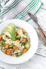 Quinoa salad with roasted vegetables and fresh avocado