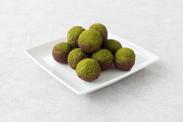 Green Matcha Energy Balls on White Plate