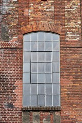 Facade with window of a disused colliery building