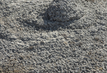 hardened concrete poured out of the cement mixer without splitting and shaking