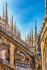 Spiers and statues on the gothic Cathedral of Milan, Italy