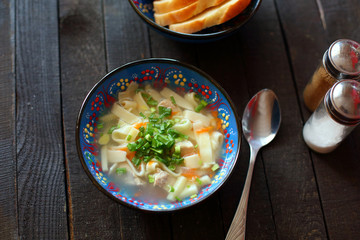 soup lagman on wooden background