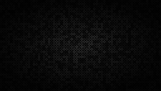 Abstract dark background of small rings in shades of black and gray colors.