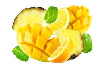 Flying mango, orange, pineapple with mint leaves