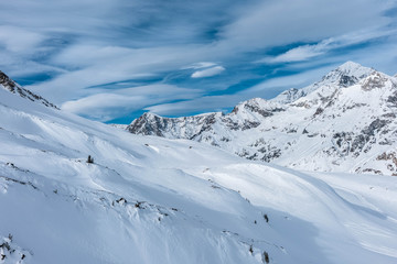 Fototapeta na wymiar Mountain tops. Alpine mountains. Ski resort view