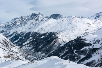 Fototapeta na wymiar Mountain tops. Alpine mountains. Ski resort view