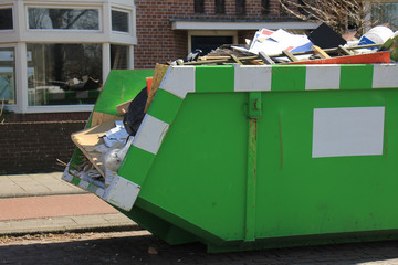 Loaded garbage dumpster