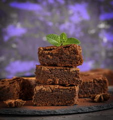 a stack of chocolate pieces of brownie