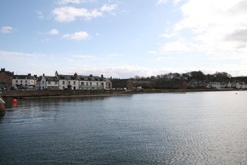 Cromarty Harbour overlooking oil rigs in the Firth. Black Isle, Scotland