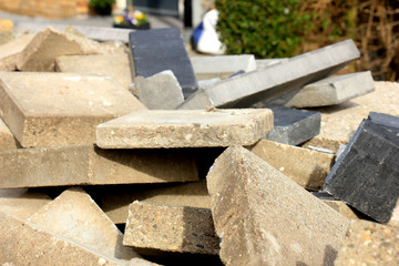 Broken bricks in a dumpster