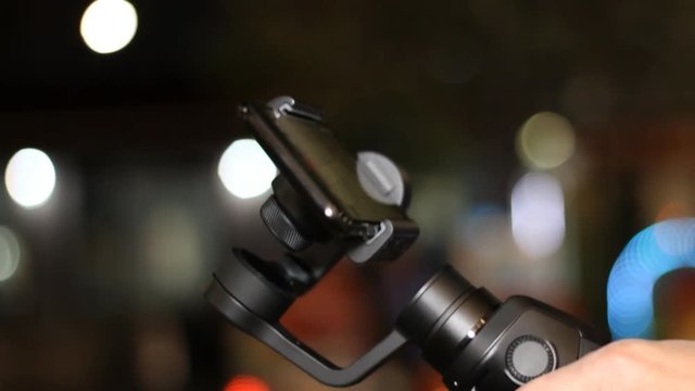 Using Gimbal with smartphone on street night bokeh 