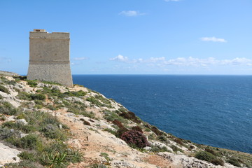 Fototapeta na wymiar Tal-Ħamrija Coastal Tower at the Mediterranean Sea in Malta