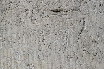 Background texture from gray limestone patterns.