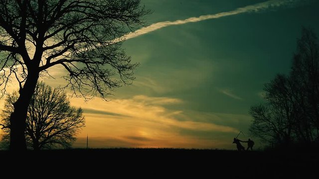 death with a scythe drags a man