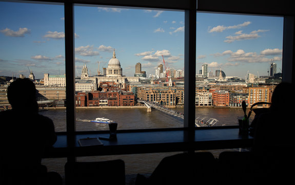 London St. Paul`s Cathedral, view from Tate Modern with Silhouetted unnamed people