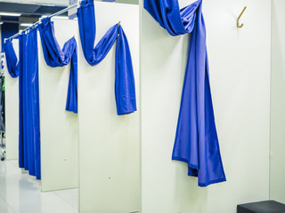 store dressing rooms with curtains in the shop