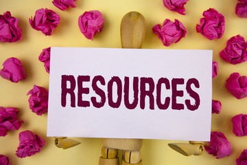 Text sign showing Resources. Conceptual photo Money Materials Staff and other assets needed to run a company written on Sticky Note paper on plain background Paper Balls and Wooden Jointed Toy.