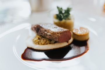 grilled Lamb steak on a plate in a gourmet restaurant