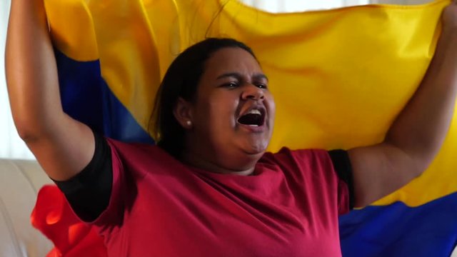 Colombian Woman Celebrating with National Flag