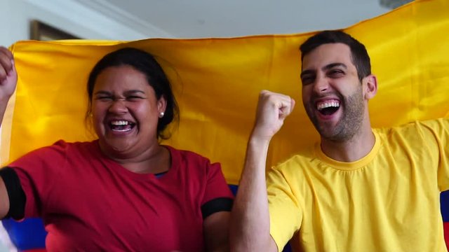 Colombian Friends Celebrating with National Flag