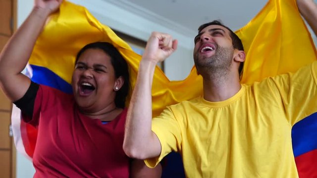 Colombian Friends Celebrating with National Flag