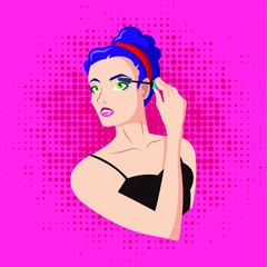 The girl paints the eyelashes