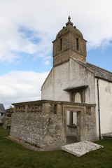 Fototapeta na wymiar Historic church with Pictish graves in Portmahomack, Scottish Highlands, Scotland
