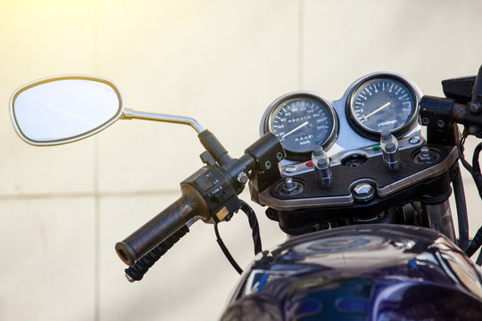 motorcycle steering wheel and dashboard - Powered by Adobe