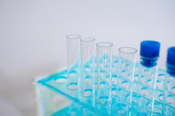 Laboratory pipette, science laboratory, doctor, science research concept,  test tube on blue background