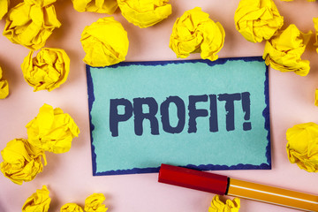 Writing note showing  Profit Motivational Call. Business photo showcasing Earned Money Payment Salary Business Revenue written on Sticky note paper within paper balls on plain background Pen