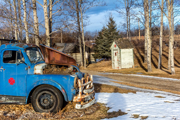 Vintage cars and rustic cabin, Millarville, Alberta, Canada