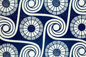 blue and white spiral background from oil paint