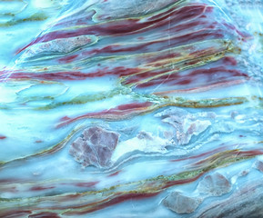 Marble mineral stone with various stone artifacts from the crystallization of volcanic rock create...