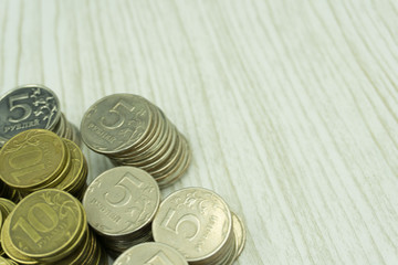 Concept of money saving, financial.Have space to write text.The coins are placed on a wooden floor.