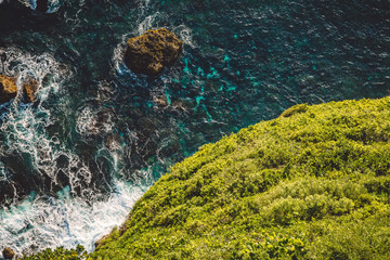 Ocean, waves and cliff in Uluwatu, Bali