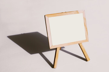 Standing sign wood board with empty white copy space area on white background to announce or introduce some information or for painting