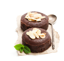 Chocolate  fondant with almonds isolated on white