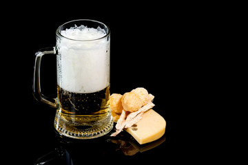 Mug of fresh beer with cheese and cheese  spheres and kalmar © filosofff