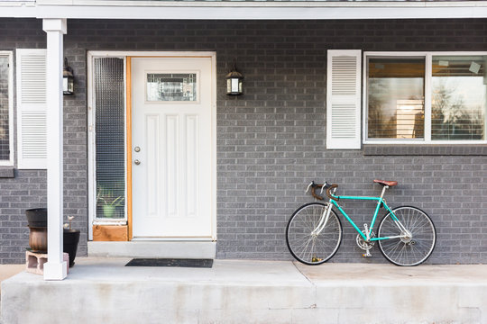 Turquoise bicycle or bike on front porch