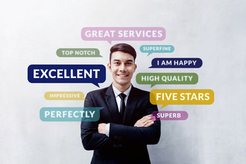 Customer Experience Concept. Happy Young Client standing at the Wall, Smiling and Crossed Arms, Looking at camera. Surrounded by Positive Review in Speech Bubble