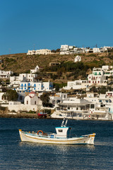 Small boat sailing in the bay