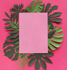 Pink card decorated with tropical leaves