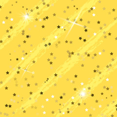 Golden Christmas background of bokeh lights and stars.