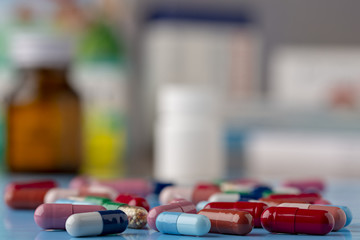Pills heap of colorful capsules