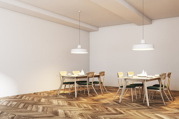 Modern white brick cafe corner, green chairs