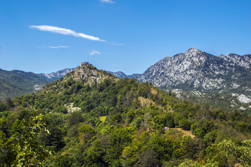 Obraz premium Europa, Montenegro, Orjen, mountain, sky, sun and fortress. Photo of a tourist postcard. Amazing place in the world. 